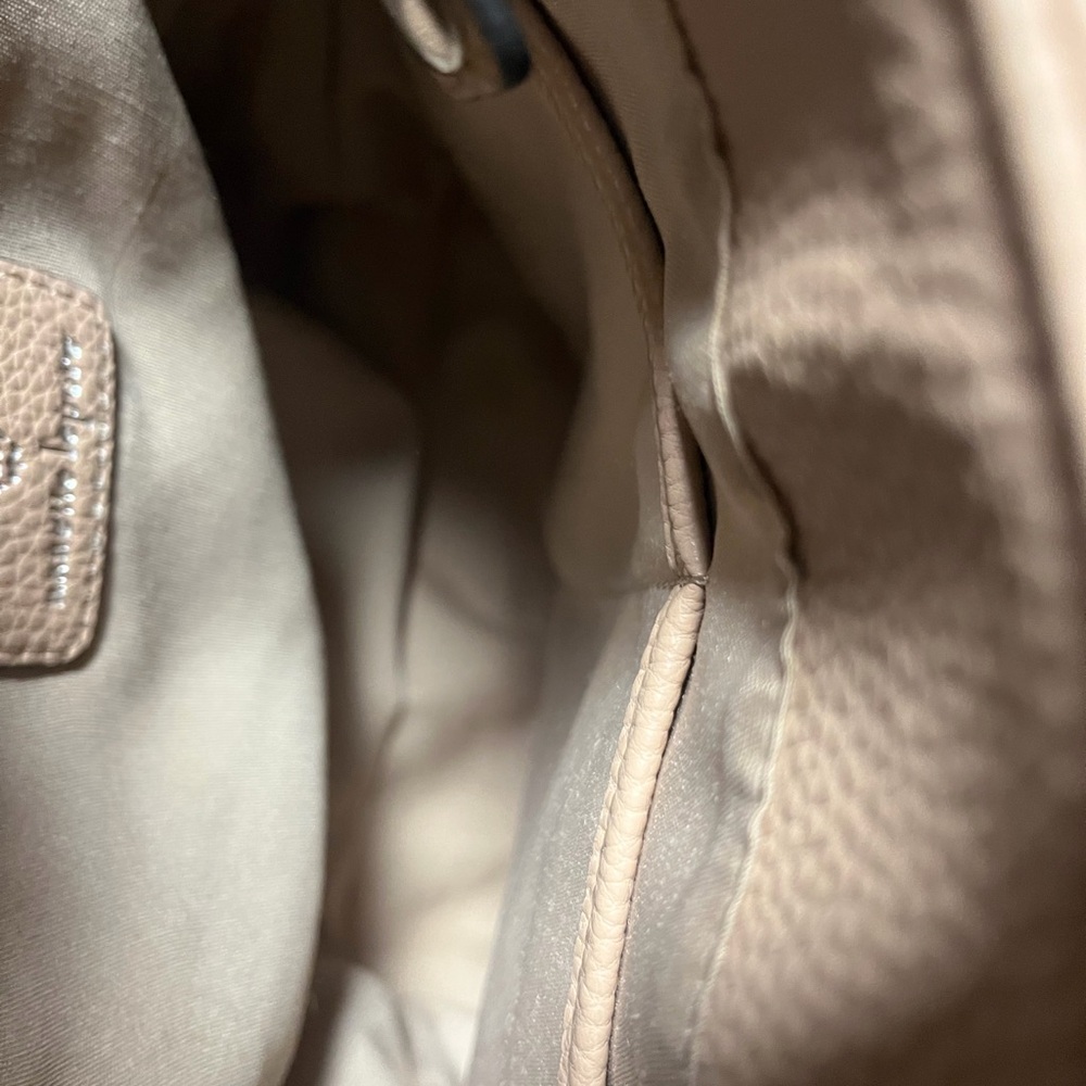 Nanette Lepore pebbled vegan leather backpack in a light pink or beige color. - Picture 3 of 9
